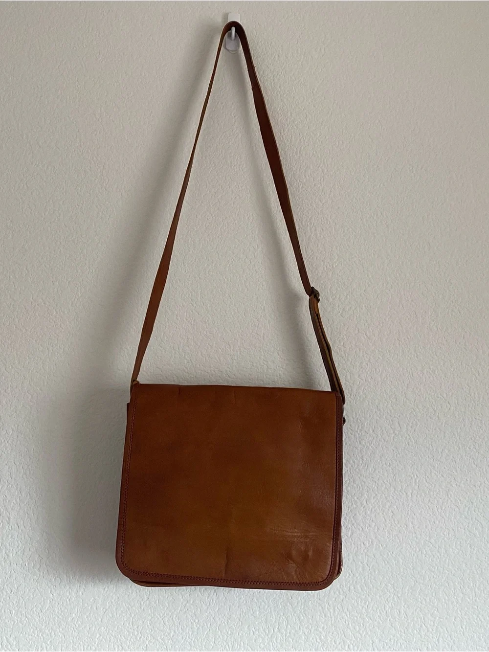 Tan crossbody messenger bag